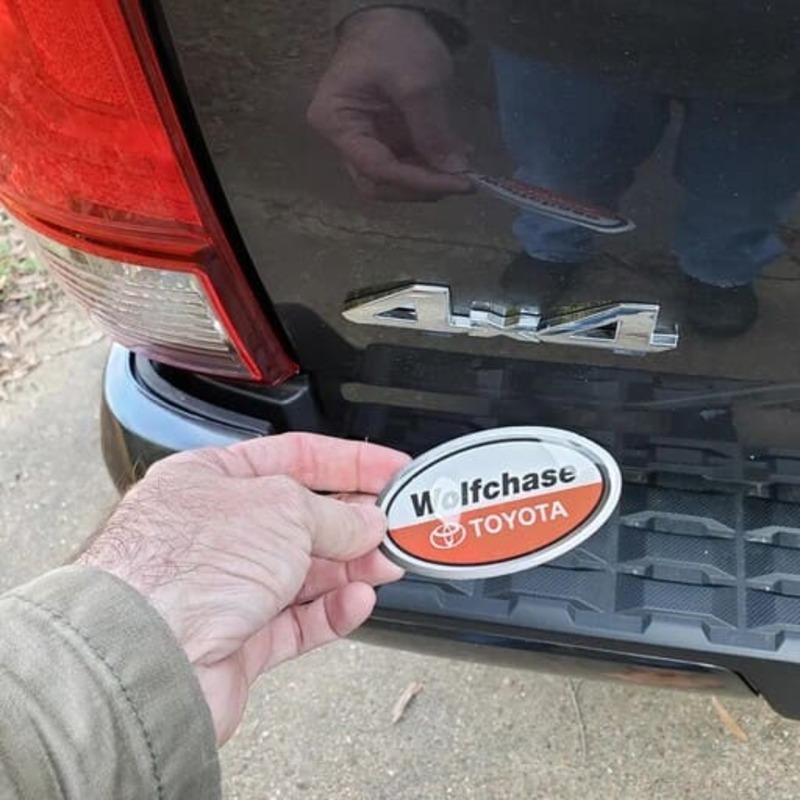 remove car dealer sticker